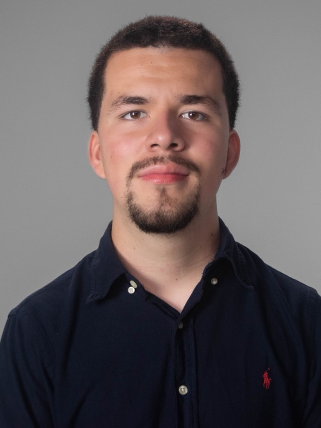 Uriel in a calm, formal portrait